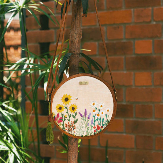 Bee and the Wildflowers round sling bag