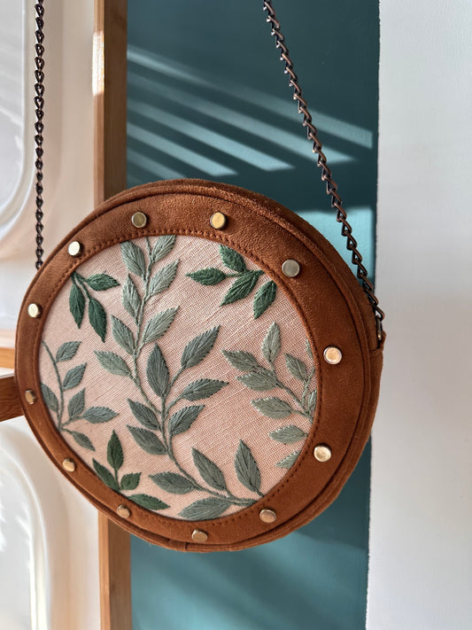 Leafy Tan Stud Round Sling Bag