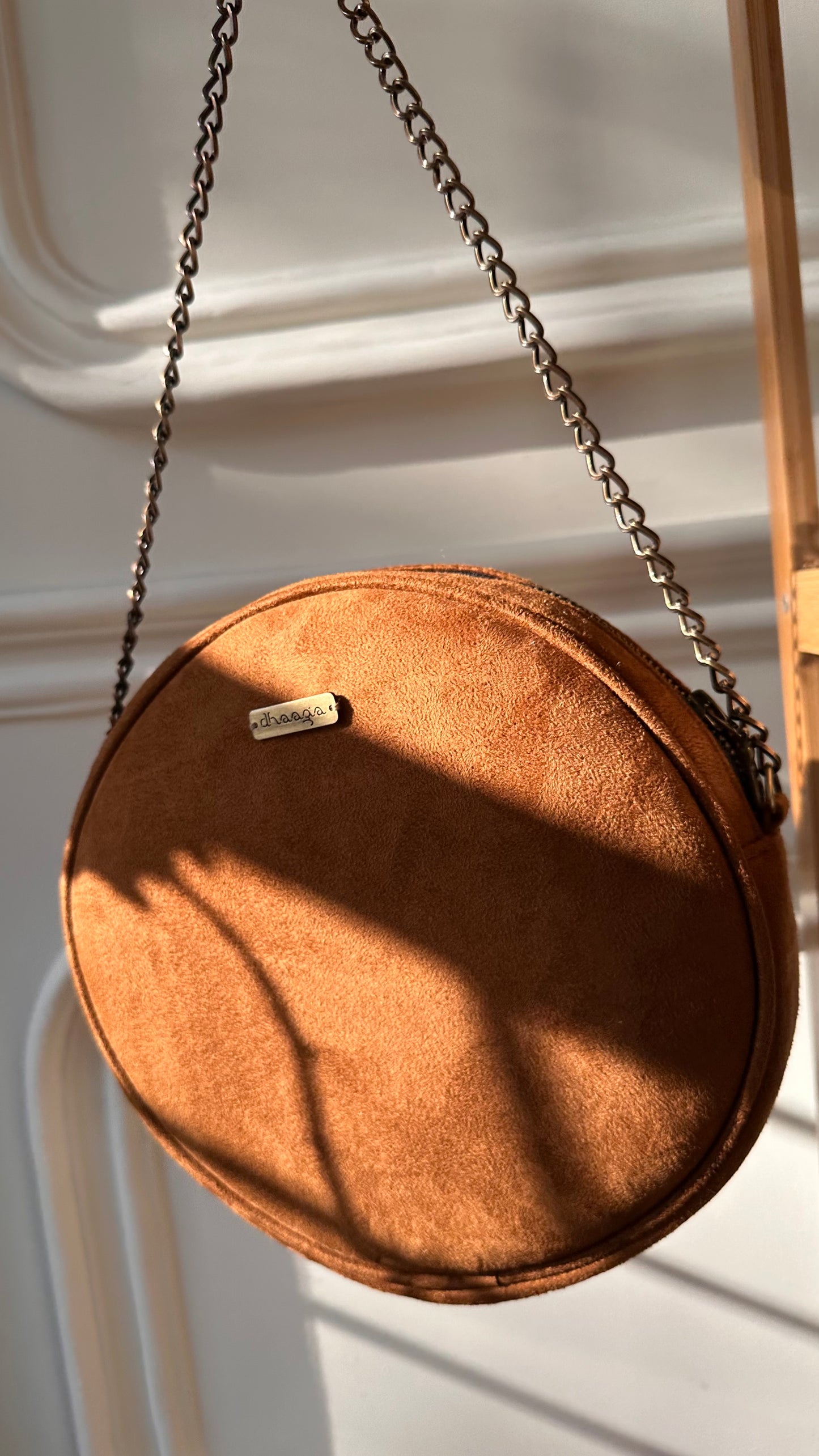 Leafy Tan Stud Round Sling Bag