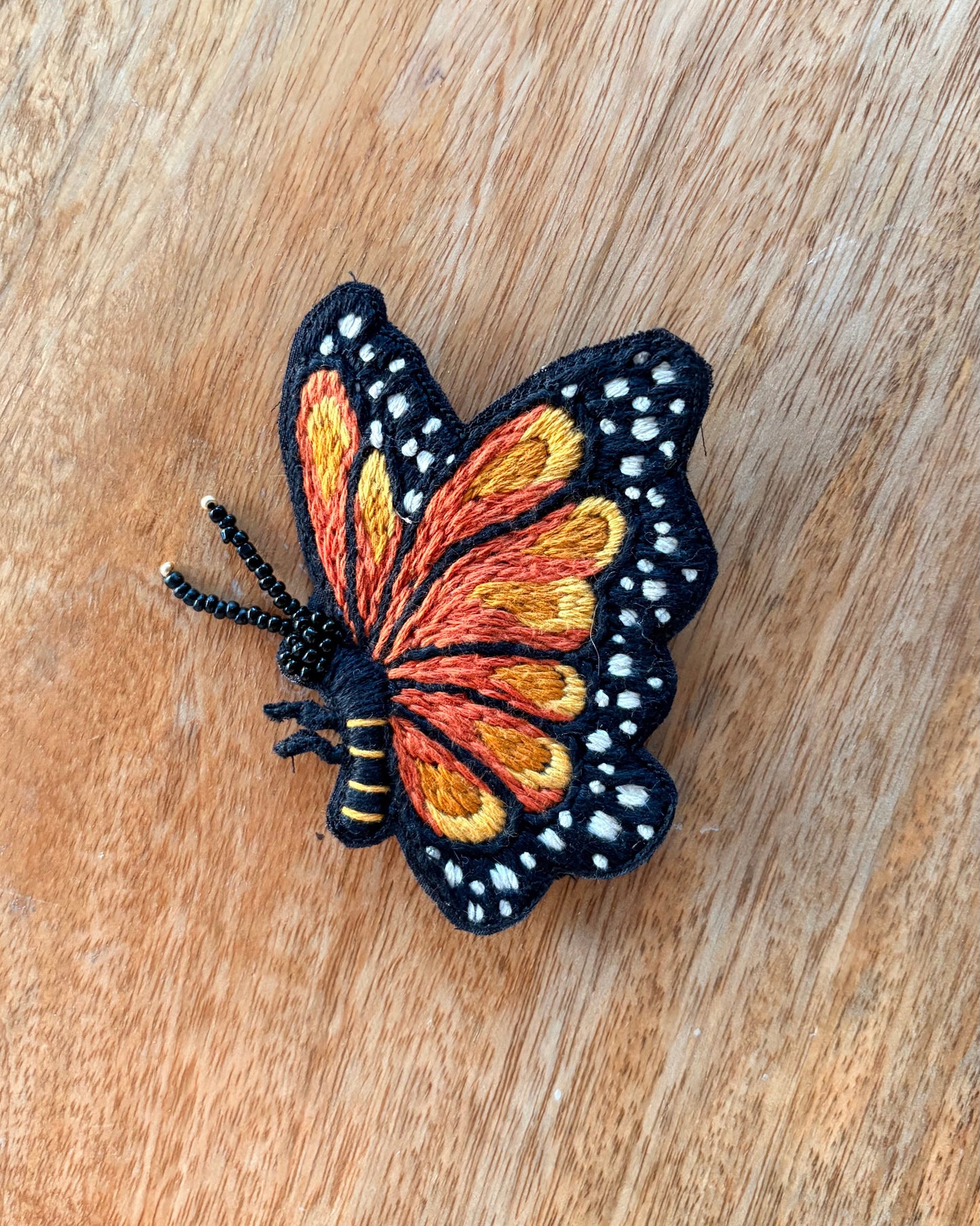 Bead-embroidered brooches