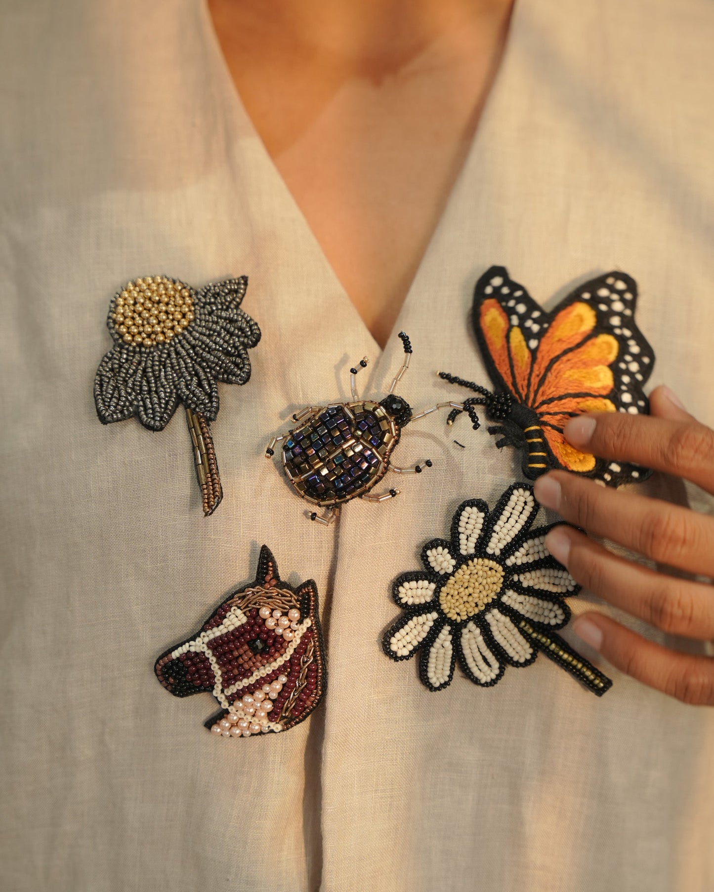 Bead-embroidered brooches
