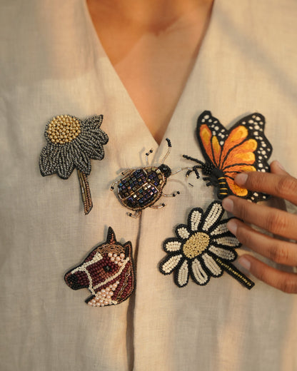 Bead-embroidered brooches