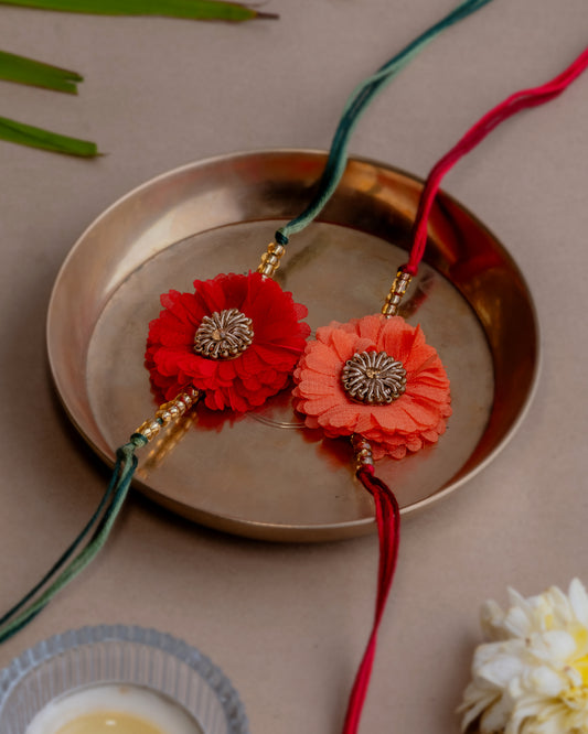 Dhaaga Floral Rakhi With Zardozi ~ Set Of 2 (Orange + Red)